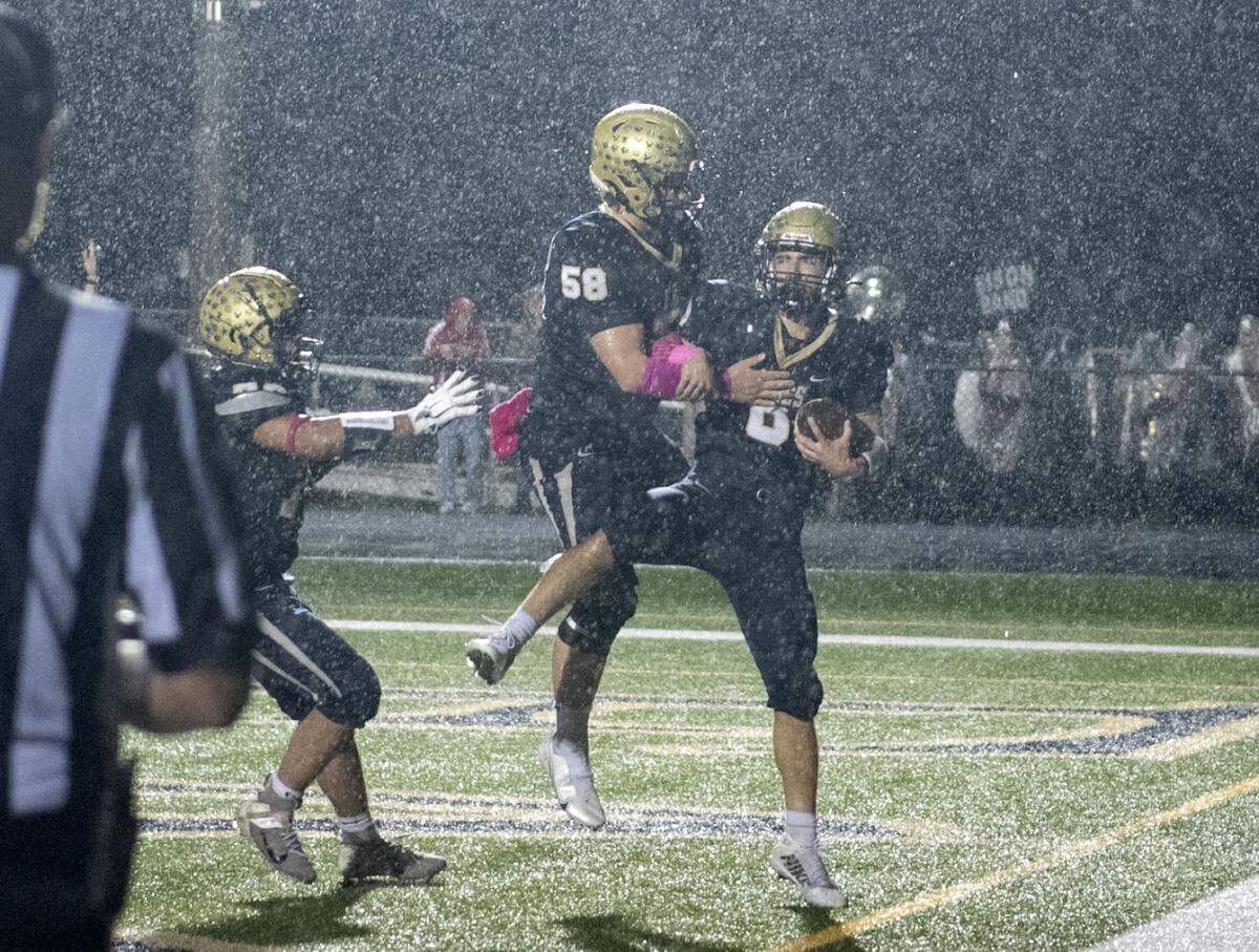 Bald Eagle Area’s Cameron Dubbs celebrates his touchdown during the game against Clearfield on Friday, Oct. 6, 2023.