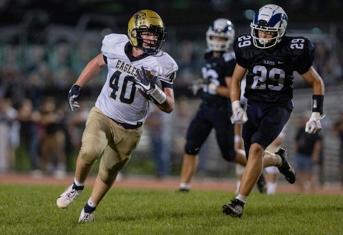 Bald Eagle Area’s Wyatt Spackman cuts down the field with the ball from Penns Valley defenders during the game on Friday, Sept. 8, 2023.