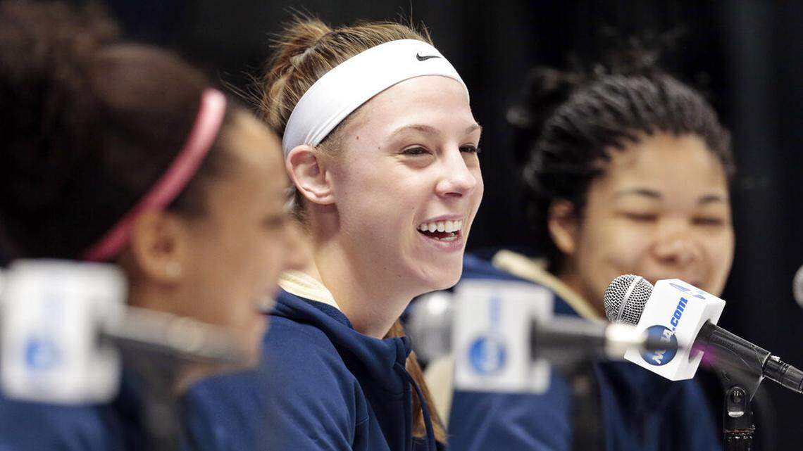 Pittsburgh forward Monica Wignot, center, answers questions during a news conference Sunday, March 22, 2015. (AP Photo/Mark Humphrey)