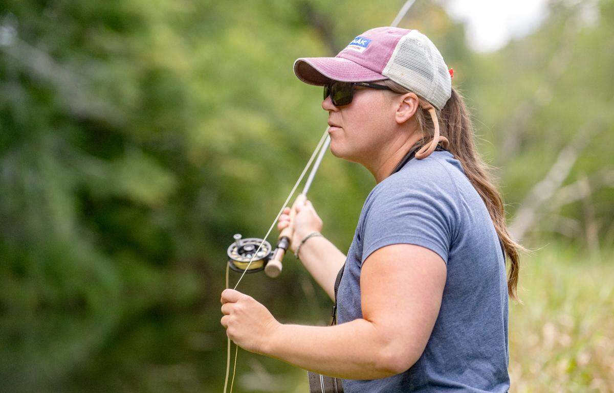 Tess Weigand dry fly fishes along a section of Pine Creek on Wednesday, Aug. 24, 2022.