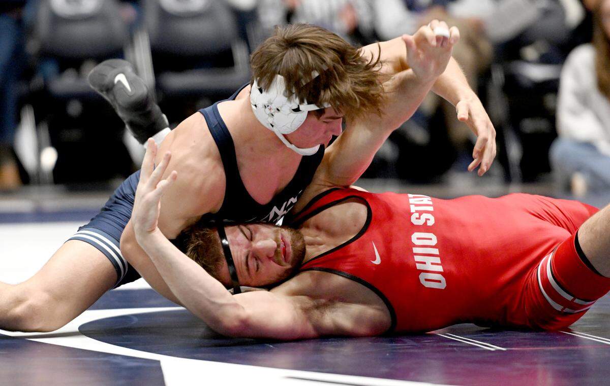 Penn State’s Tyler Kasak wrestles Ohio State’s Dylan D’Emilio in the 149 lb bout during the match on Friday, Feb. 2, 2024 in Rec Hall.