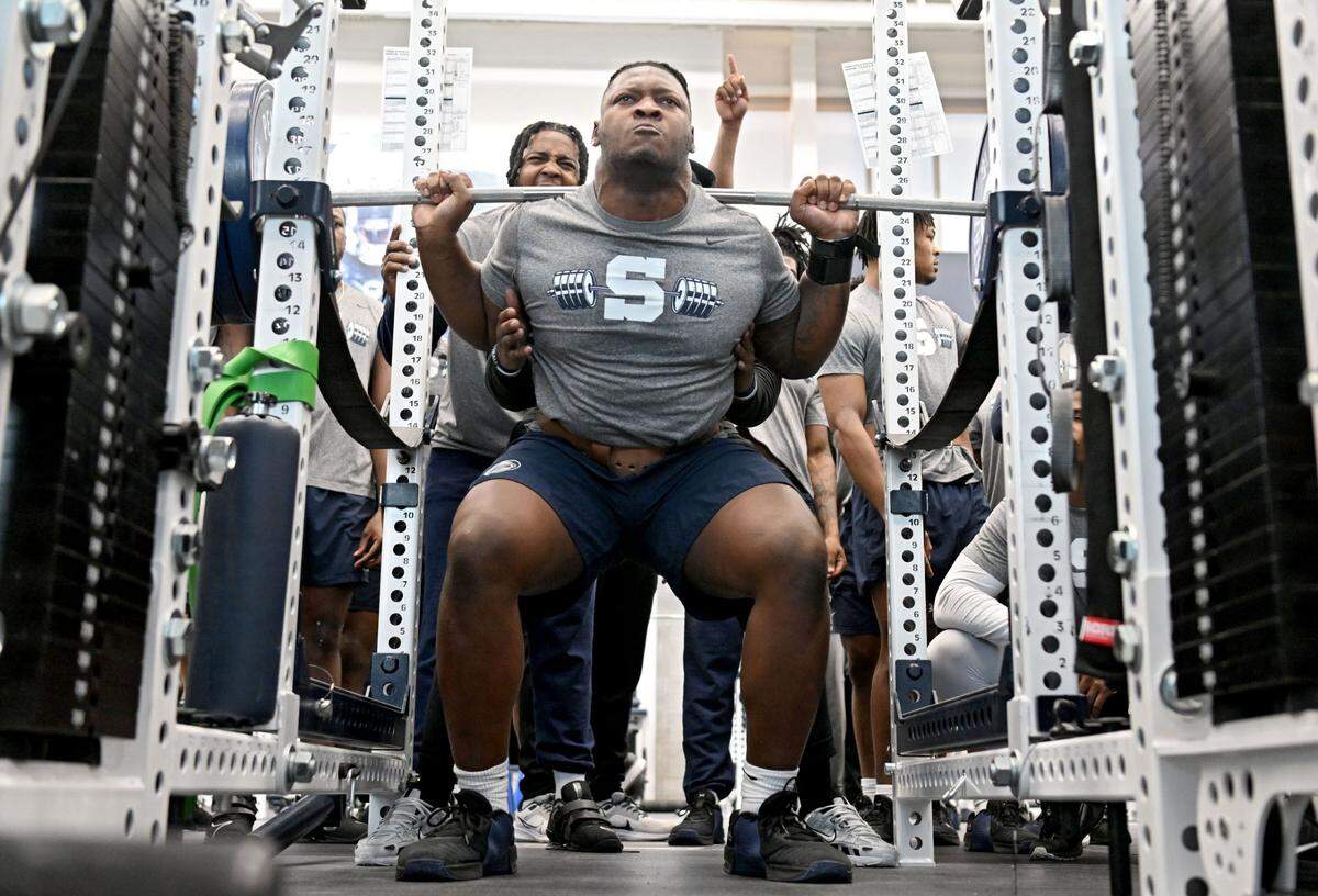 Penn State defensive tackle Zane Durant lifts during a winter workout session on Thursday, Feb. 29, 2024.