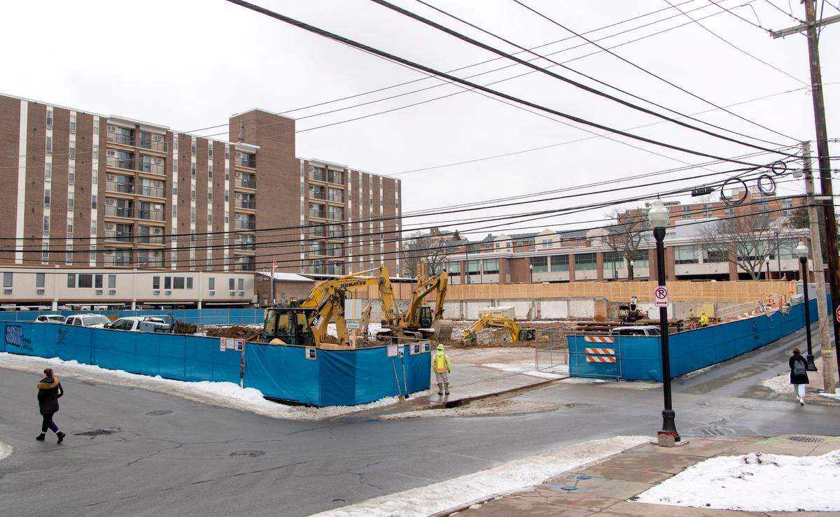 Construction is underway for a new building on Hetzel Street and College Avenue on Tuesday, Feb. 8, 2022.