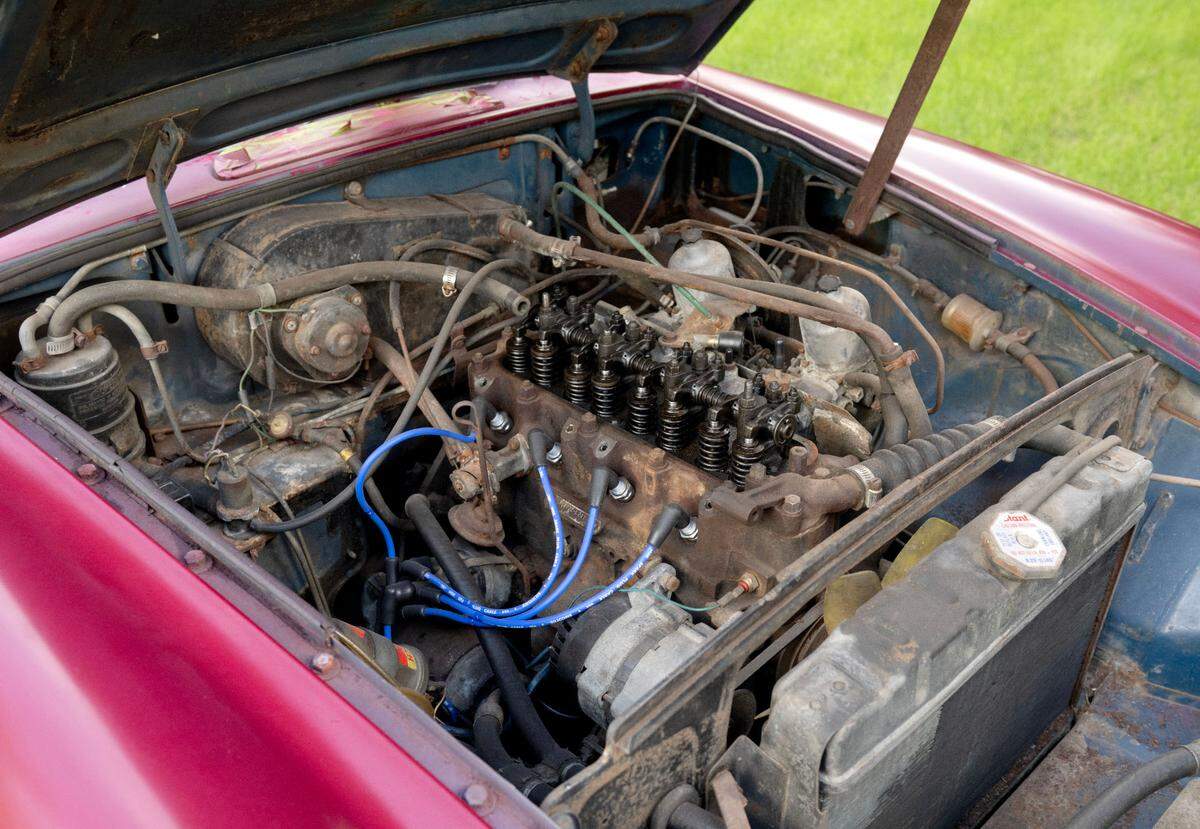 The engine on Dylan Becks’ 1974 MGB is a work in progress for he and his friends.