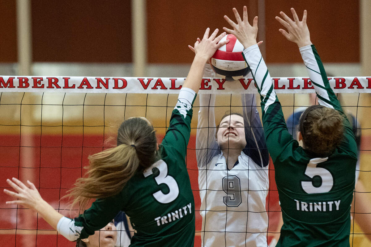 Philipsburg-Osceola’s Abby Lumadue blocks the ball during the PIAA state volleyball title game, where Philipsburg-Osceola High School faced Trinity High School at Cumberland Valley High School on Saturday, Nov. 21, 2020 in Mechanicsburg, Pa.