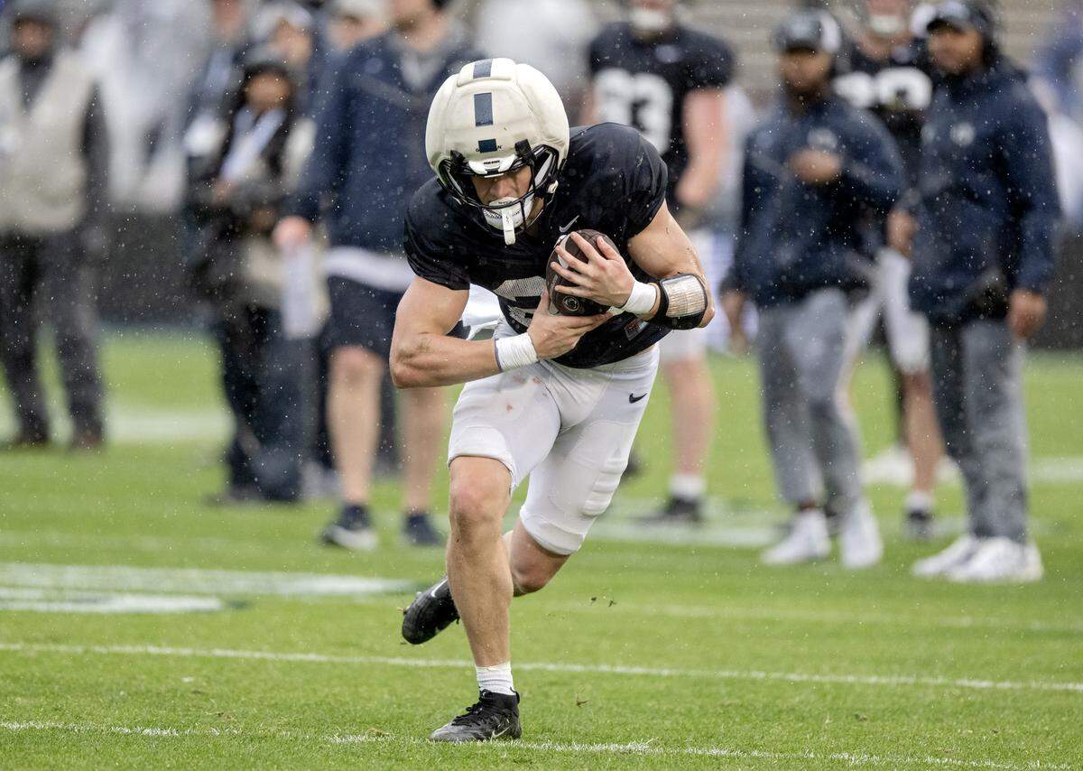 Penn State running back Carson Hansen runs with the ball during the Blue-White Practice on Saturday, April 25, 2026.