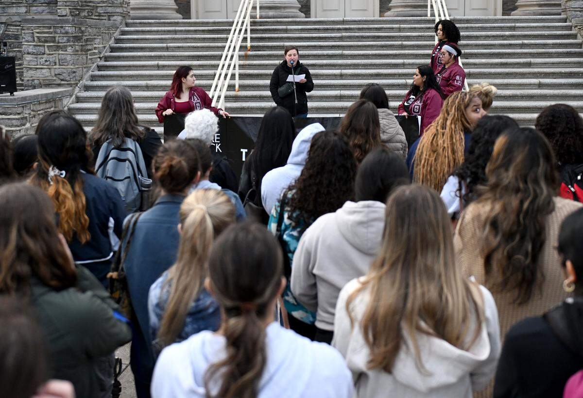 A crowd gathers to listen to a representative from Penn State CAPS as a part of “Take Back the Night” on Wednesday, April 1, 2026. Lambda Theta Alpha hosted the event, which is part of Sexual Assault Awareness Month.