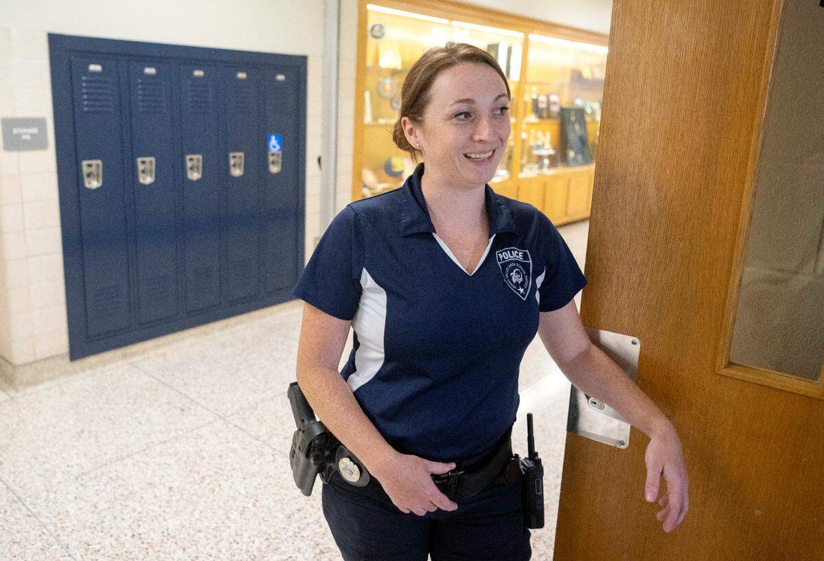 Penns Valley school district police officer Nicole Eckley chats with teachers in the high school on Thursday, Sept. 7, 2023.