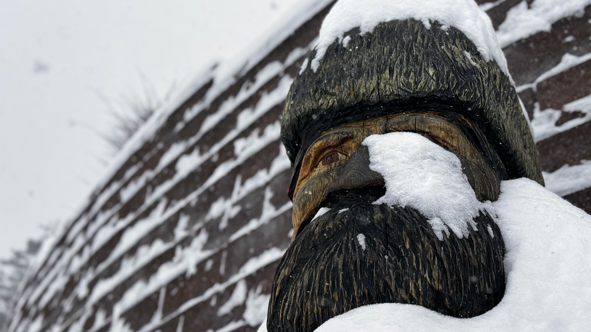 A wooden sculpture of the Philipsburg-Osceola High School mascot collects snow in Philipsburg on Jan. 25, 2026.