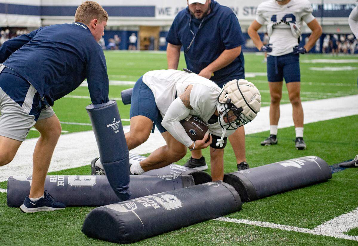 Penn State wide receiver Parker Washington runs a drill during practice on Wednesday, Sept. 7, 2022.