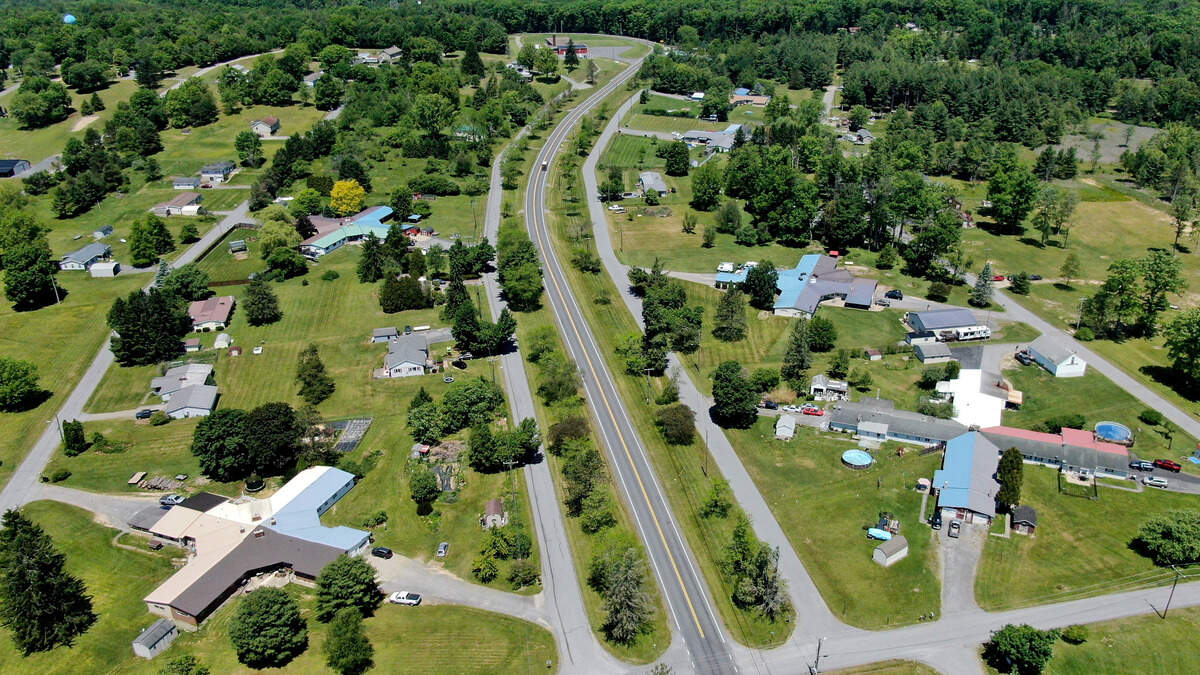 An aerial view of Pine Glen shows X-shaped homes on Friday, June 5, 2026.