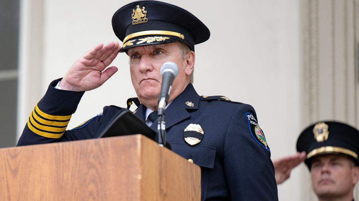 State College police Chief John Gardner salutes as taps is played during the 2025 Centre County Peace Officers Memorial Ceremony on May 14, 2025 outside the Centre County Courthouse.