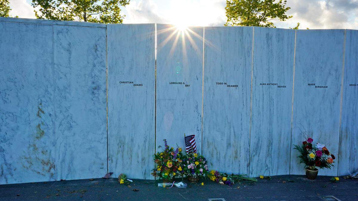 The sun sets behind The Wall of Names at the Flight 93 National Memorial in Shanksville on Sept. 10, 2021.