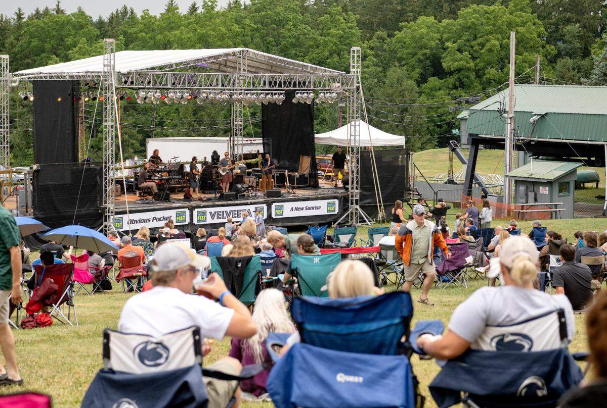 The crowd starts to fill in as Obvious Pocket plays at WingFest at Tussey Mountain on Thursday, Aug. 4, 2022.