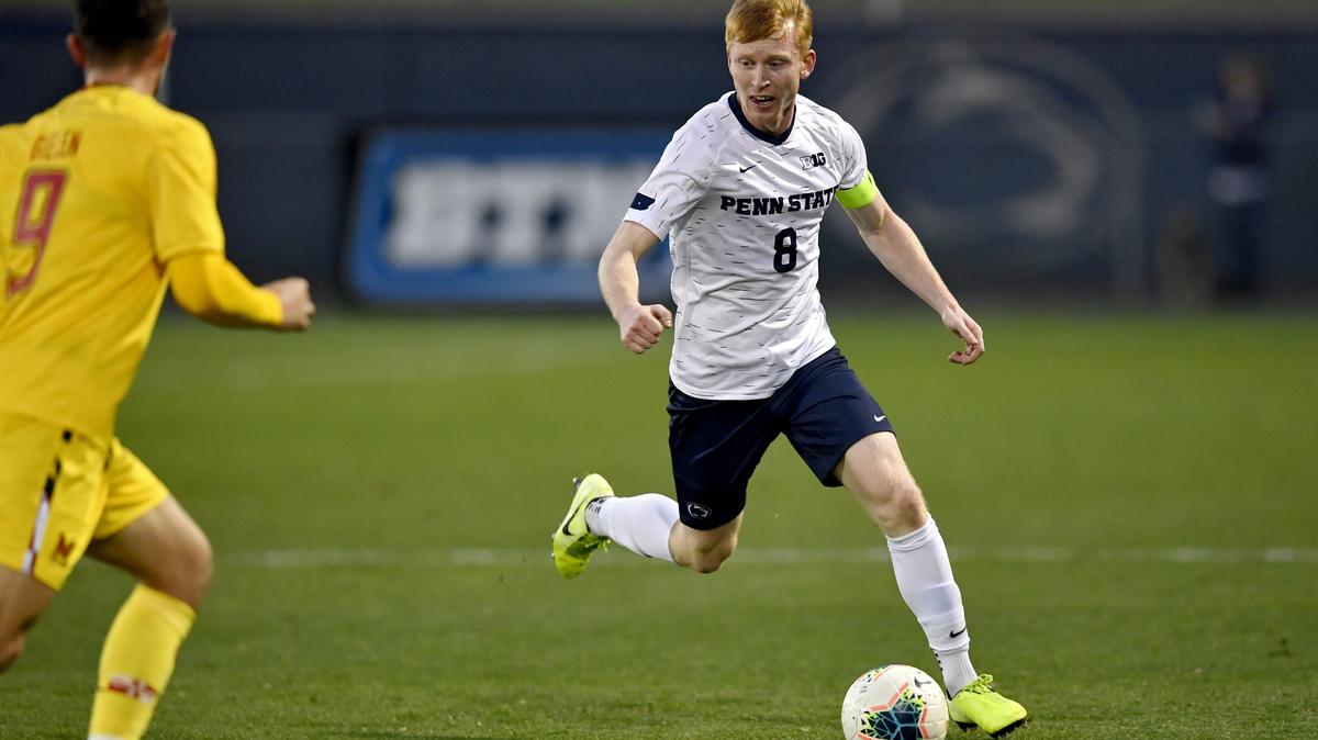 Penn State’s Aaron Molloy dribbles around a Maryland defender during the game on Tuesday, Oct. 29, 2019 at Jeffrey Field. Penn State won, 3-2 in overtime.