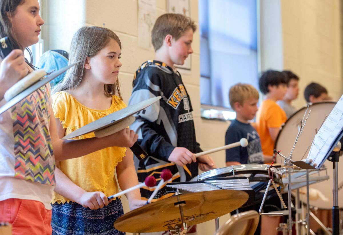 Fourth grader Gwen Yearka plays the symbols during brand practice at Ferguson Township Elementary School on Wednesday, May 11, 2022.