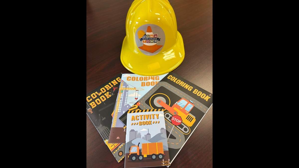 A closer look at the free hard hats and activity books that will be given out as part of the “Calder Way Construction Crawl” that kicks off Monday and continues through July.