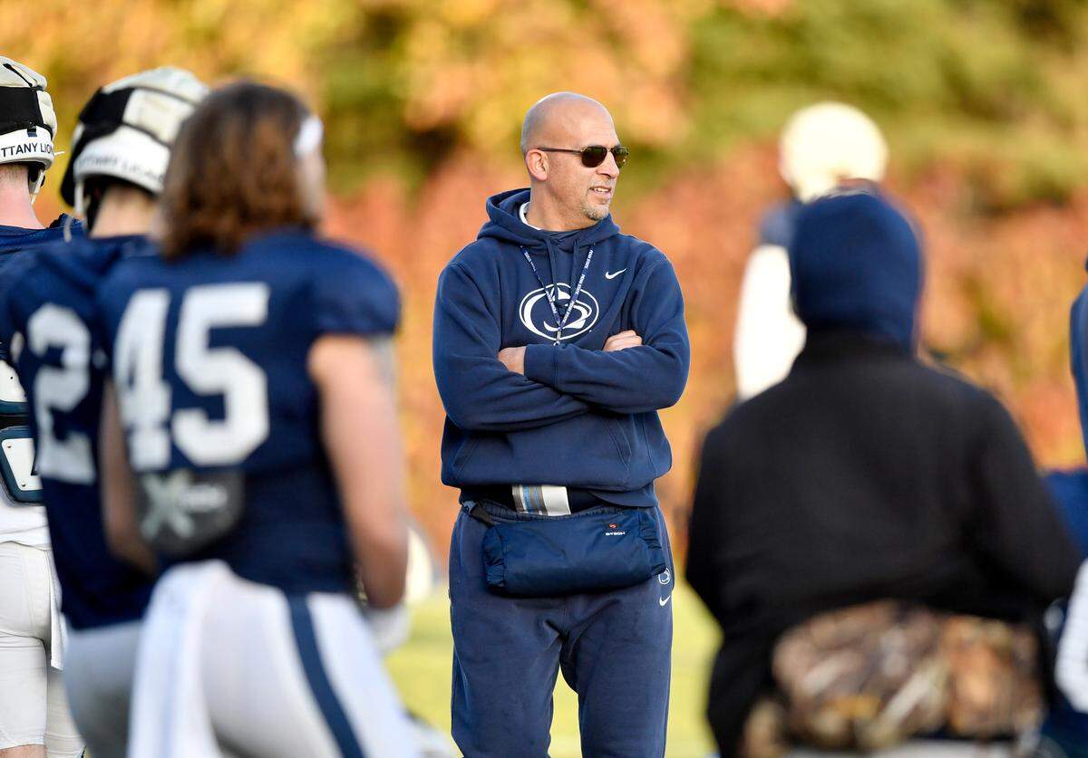 Penn State football coach James Franklin watches the defense run a drill during practice on Wednesday, Nov. 24, 2021.
