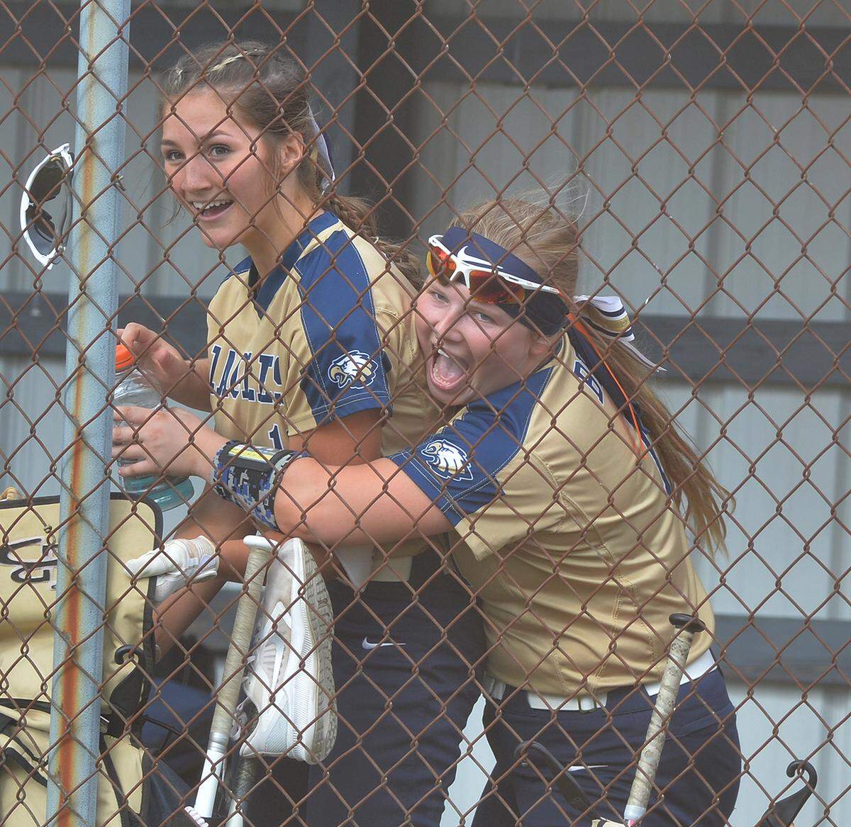 Bald Eagle Area’s Maddie Perry, left, gets a bear hug from teammate Autumn Tobias after hitting a home run over the right centerfield fence in sixth inning action against Central High School Thursday May 26, 2022, at Central High School.