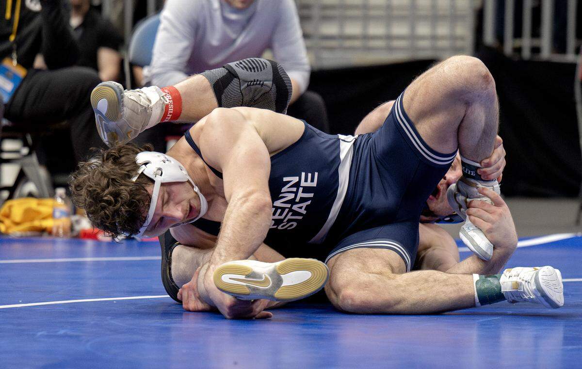 Penn State's Levi Haines wrestles Iowa’s Patrick Kennedy in a 174-pound semifinal bout of the NCAA wrestling championships on Friday, March 20, 2026.