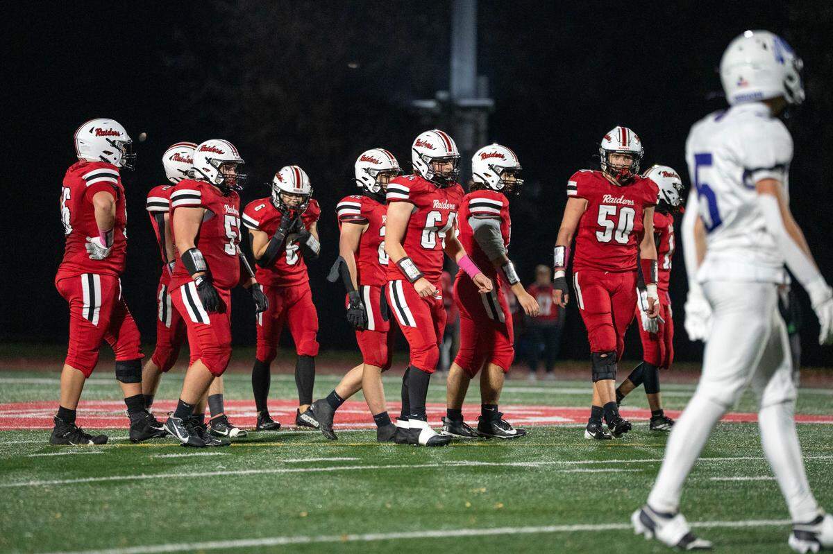 Bellefonte walks up to the line of scrimmage, preparing for the next play during a Friday night football game against Shamokin in Bellefonte, Pa., on Nov. 14, 2025. The Indians beat the Red Raiders 42-13 in the first round of the PIAA Class 4A championships.