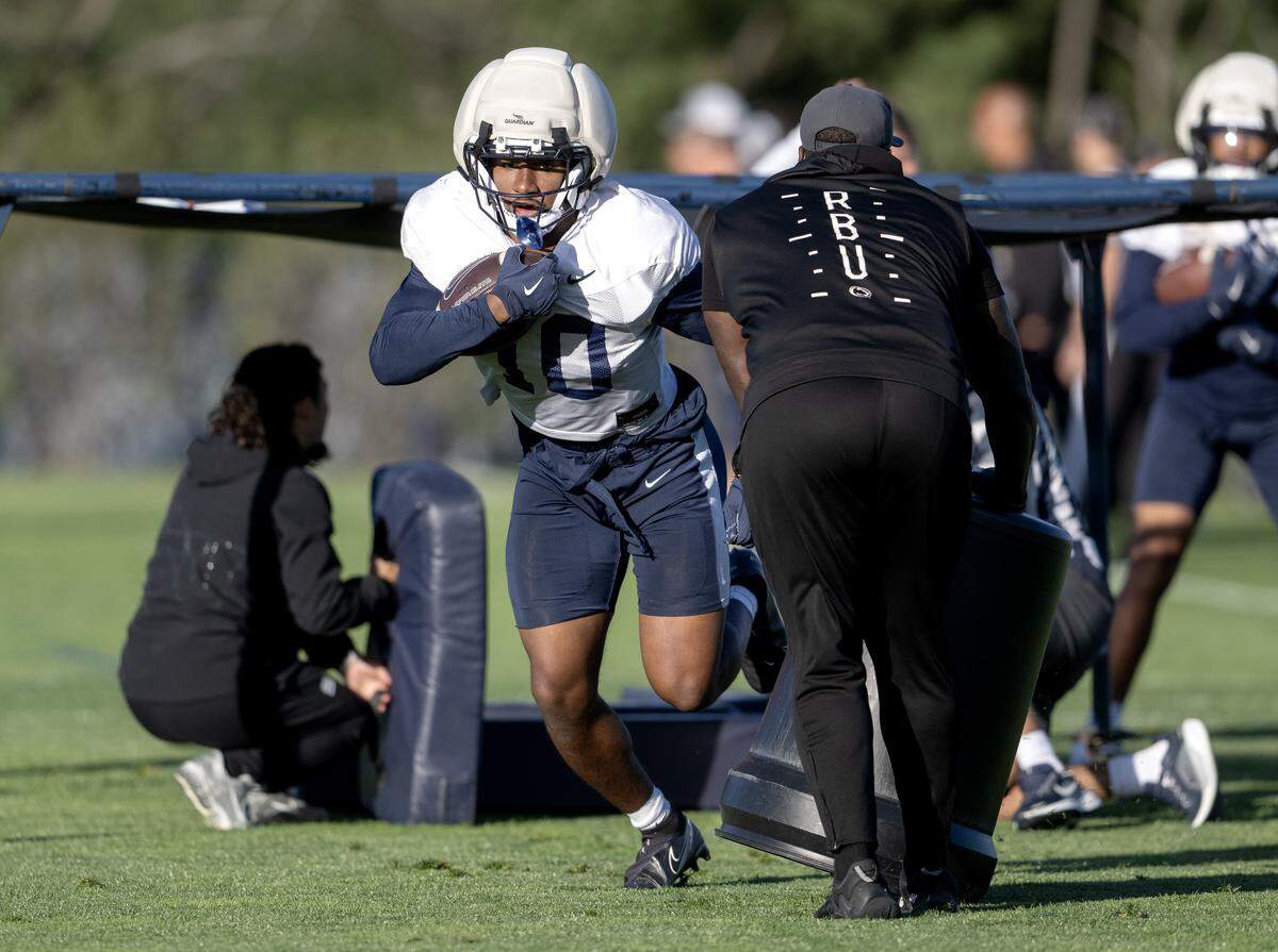 Penn State running back Nick Singleton runs a drill during practice on Wednesday, Oct. 8, 2025.  