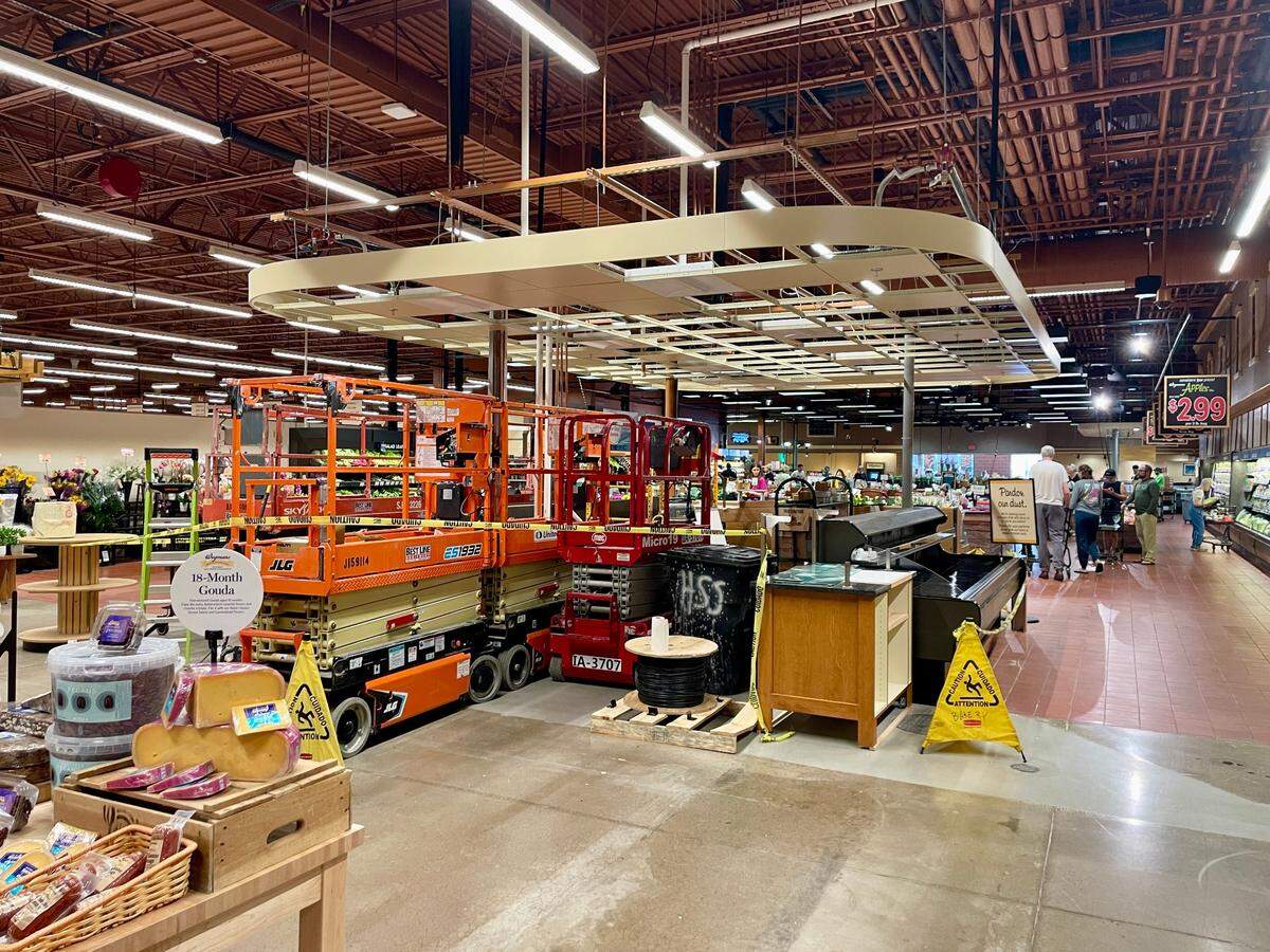 Work continues on the upgraded cheese department at State College’s Wegmans in this Aug. 18 file photo. Construction walls surrounding the area were removed on Aug. 15.