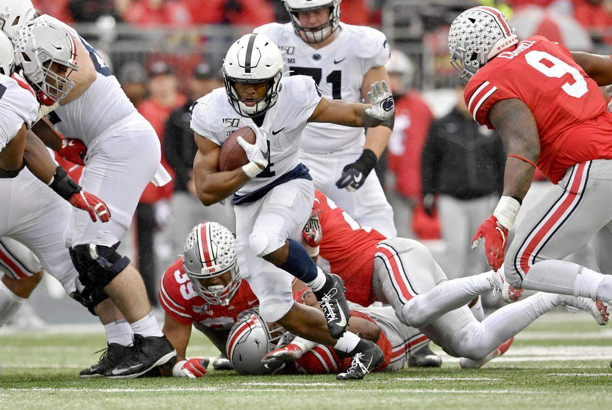 Penn State running back Journey Brown cuts past Ohio State defenders and run 18 yards for a touchdown in the third quarter of the game on Saturday, Nov. 23, 2019.