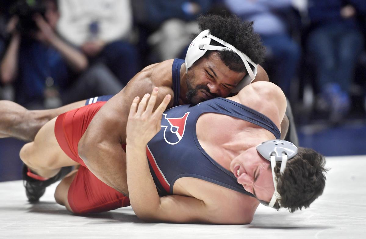Penn State’s Kyle Conel controls Penn’s Cole Urbas in the 197 lb bout during the match on Sunday, Dec. 8, 2019. Conel won by decision, 6-5.