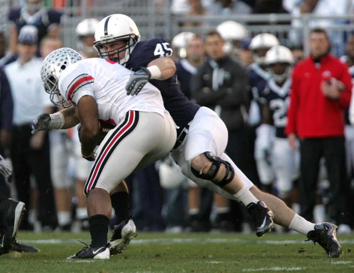 Penn State's Sean Lee tackles Ohio State's Brandon Saine at Beaver Stadium on Saturday, November 7, 2009. CDT/Christopher Weddle