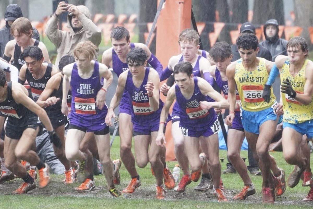 From left, State College’s Luke Bradbury, Isaac Oppermann and Theo Oppermann race at the start of the Nike Cross National Boys 5K Championships on Saturday in Portland, Oregon.