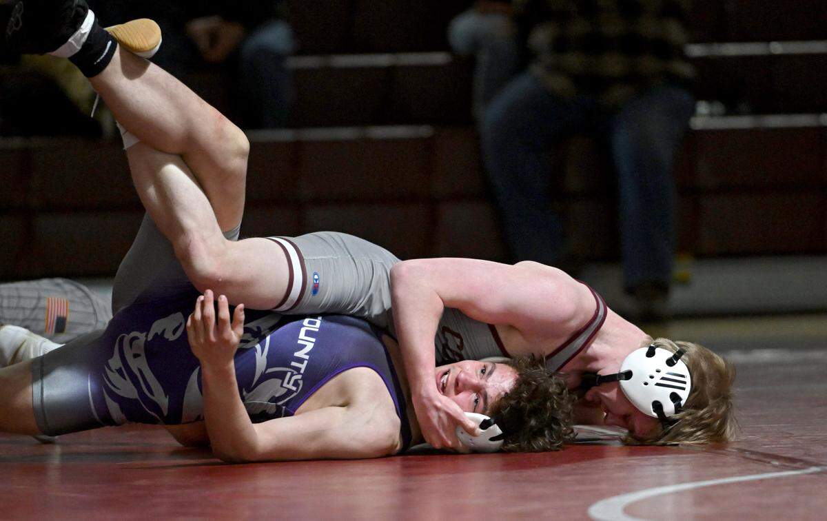 State College’s Jacob Campbell controls Mifflin County’s Kamden Everly in the 139 lb bout of the match on Thursday, Jan. 25, 2024.