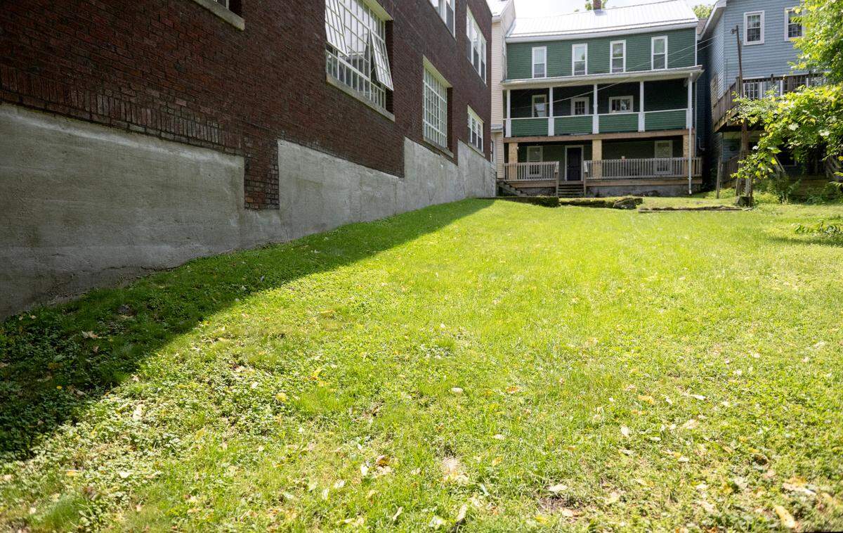 The outdoor seating area at Shaky Hands Coffee Shop on Tuesday, June 10, 2025. Patrons are invited to bring a blanket or chair to sit and enjoy their drinks.