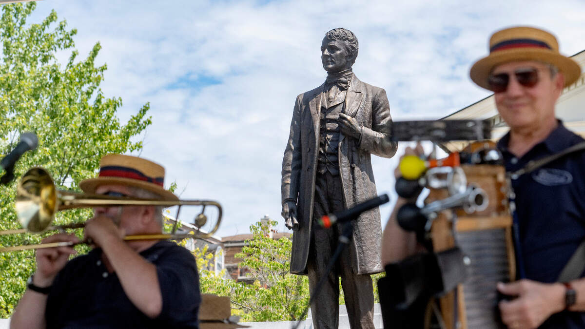 The statue of Andrew G. Curtin is the backdrop as the Decons of Dixieland entertain the crowd during the 39th Annual Bellefonte Arts and Crafts Fair on Friday, Aug. 5, 2022.