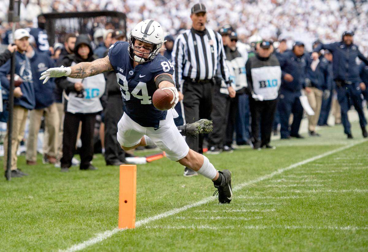 Penn State tight end Theo Johnson dives but falls short of the end zone during the game against Michigan on Saturday, Nov. 13, 2021.