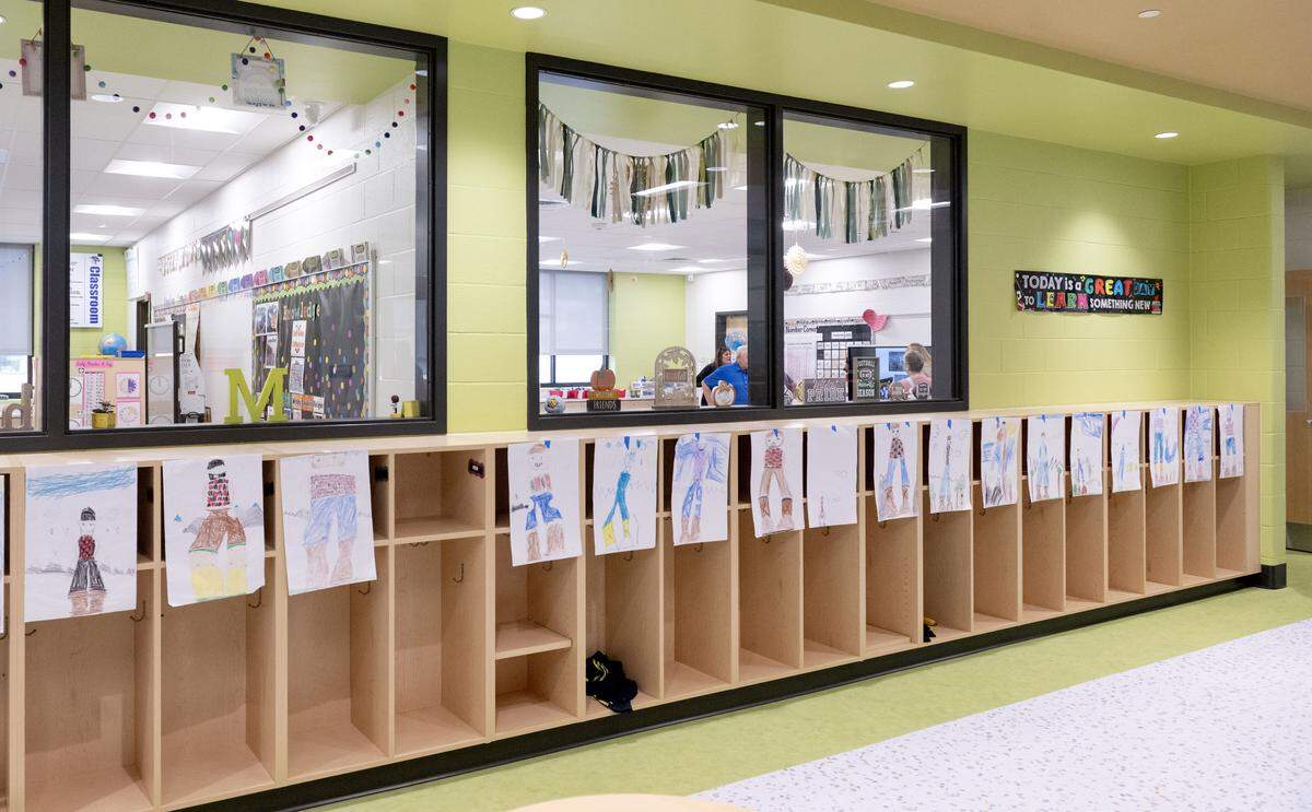 Student cubbies line the hallways inside the new Liberty-Curtin Elementary School on Monday, Sept. 22, 2025.