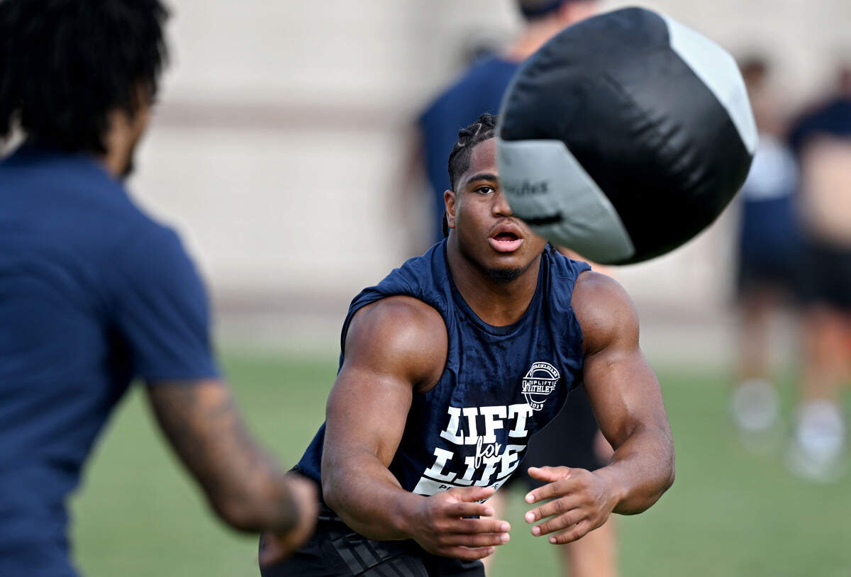 Penn State running back James Peoples tosses the weighted ball in the relay during Lift For Life on Wednesday, July 1, 2026.
