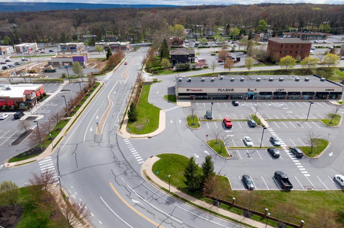 Less cars travel on Colonnade Way on May 1, 2020 as many stores remain closed.