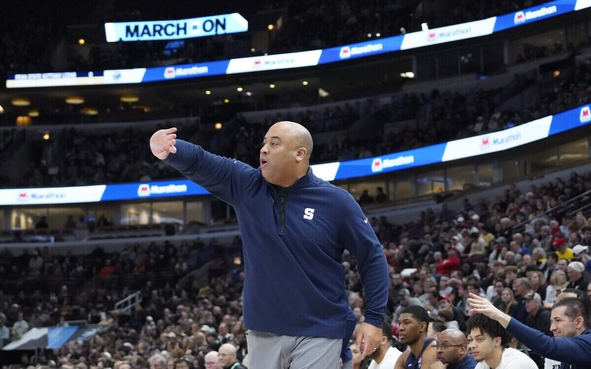 Penn State Nittany Lions head coach Micah Shrewsberry gestures to his team during the first half of Sunday’s game at United Center.