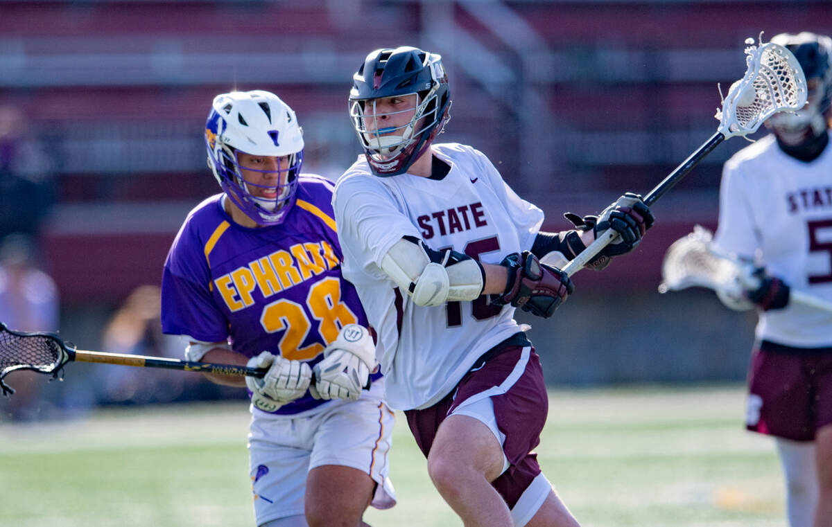 State College’s Will Kerber runs ahead of an Ephrata defender during the District 3 playoff game on Monday, May 17, 2021.