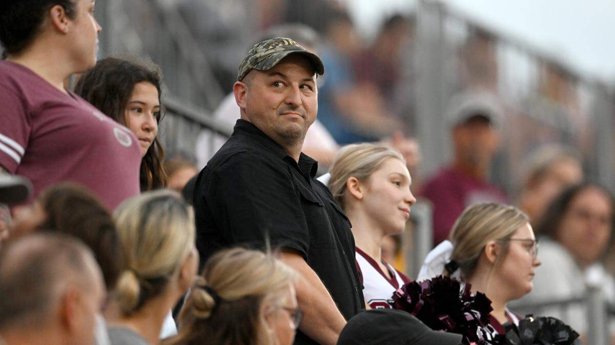 Hospital Corpsman Matt Moritz is honored during the State College football game on Aug. 26 at Memorial Field.