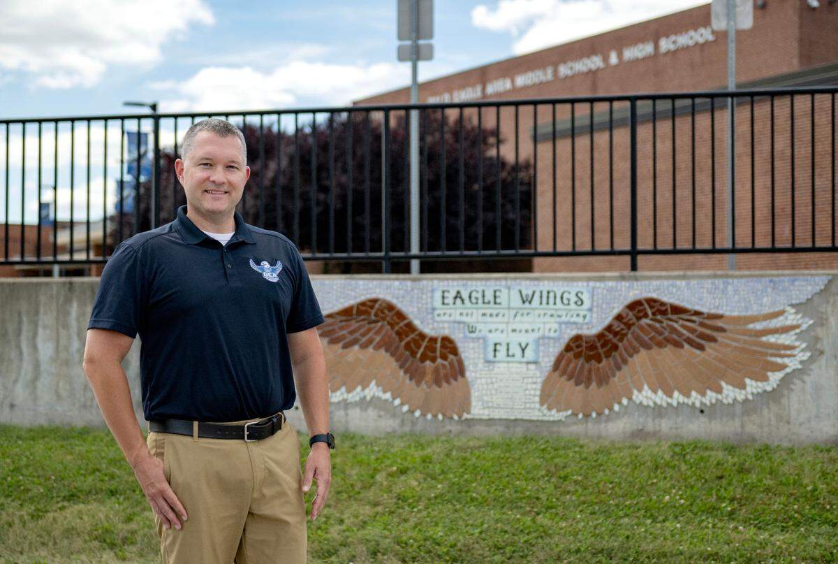 Bald Eagle Area School District’s new superintendent Christopher Santini poses outside of the high school on Tuesday, July 2, 2024.
