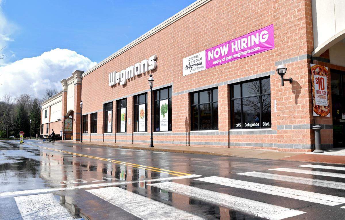Wegmans on North Atherton Street has a large sign that they are hiring on Wednesday, April 1, 2020.