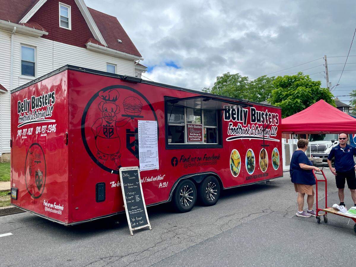 New to Arts Fest in 2024, Belly Busters Food Truck & Catering LLC is set up at the intersection of South Allen Street and Nittany Avenue.