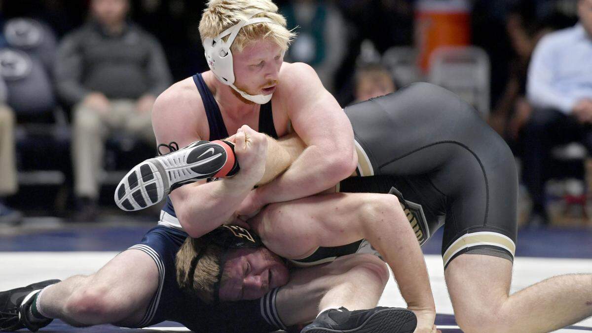 Penn State’s Bo Nickal controls Purdue’s Max Lyon in the 184 pound bout during the match on Friday, January 19, 2018 at Rec Hall.  Nickal won by fall at 1:55.