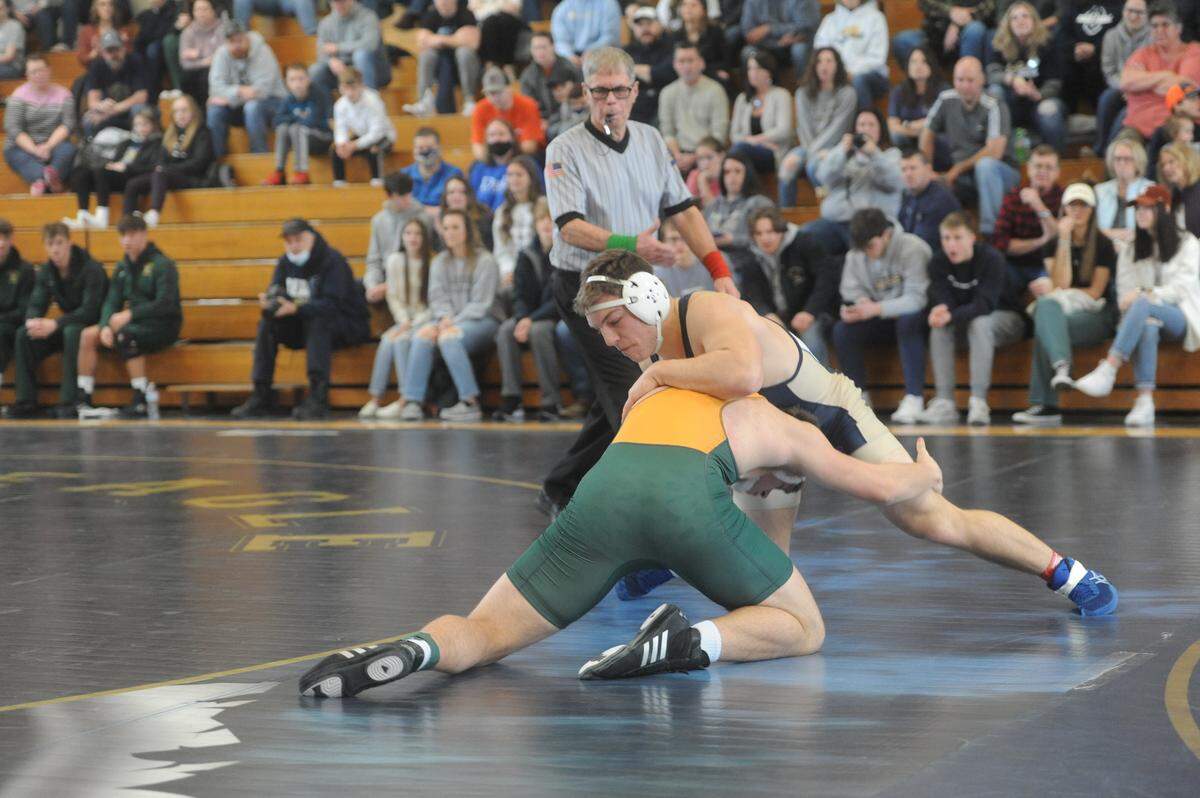 Bald Eagle Area’s Matthew Knepp fights off a takedown attempt from Forest Hills’ Kirk Bearjar in their 215-pound bout of the Eagles’ 32-30 loss in the District 6 Class 2A semifinals on Saturday, Feb. 5, 2022. Bearjar topped Knepp, 3-2.