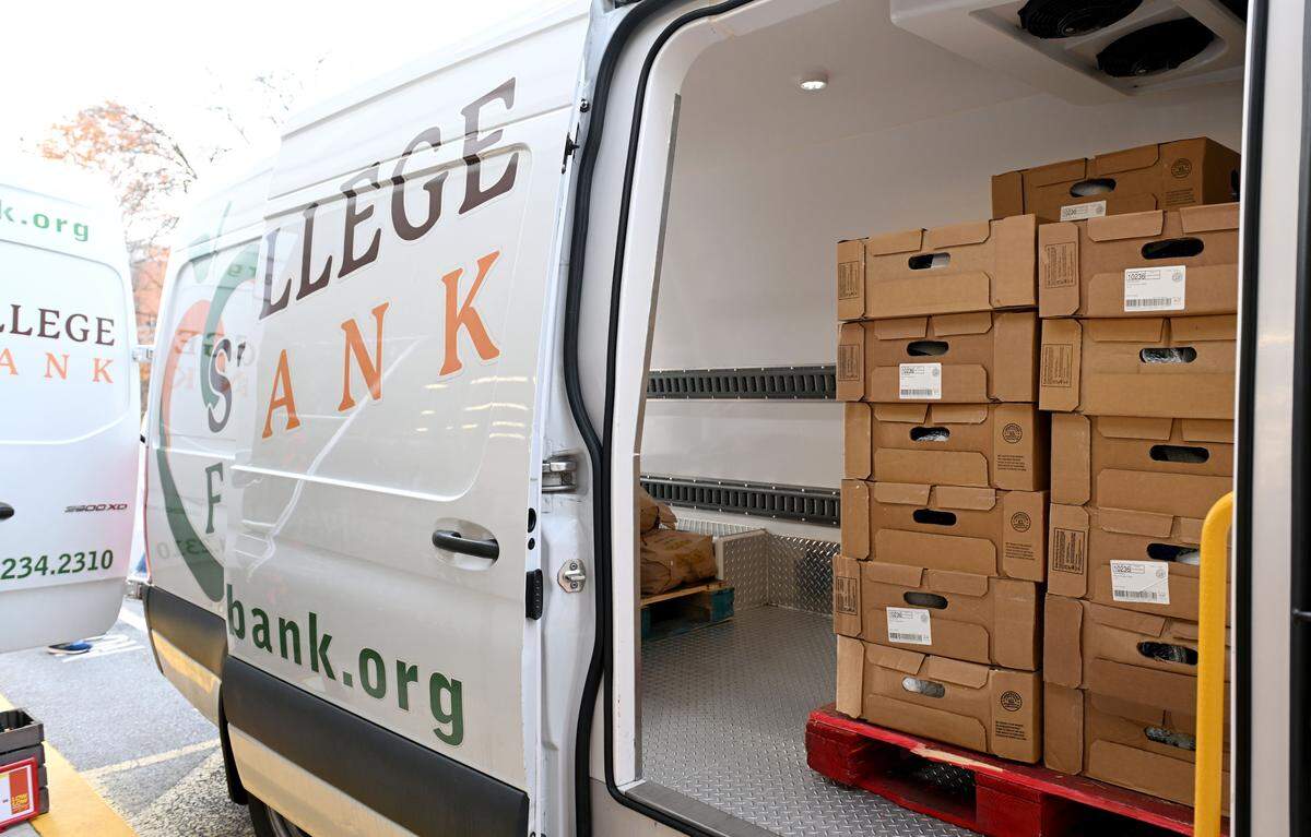 The Cherry Tailgate Group raised money throughout the Penn State football season to donate the makings for at least 80 Thanksgiving dinners to the State College Food Bank on Monday, Nov. 24, 2025.
