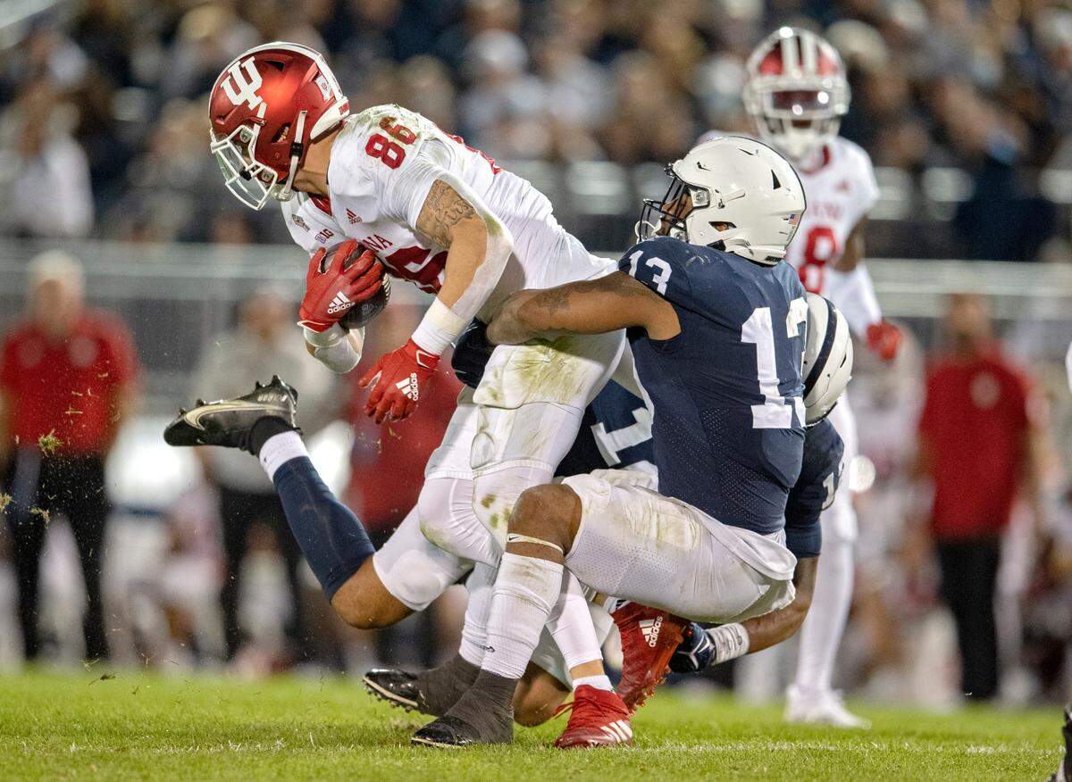 Penn State linebacker Ellis Brooks pulls down Indiana tight end Peyton Hendershot.