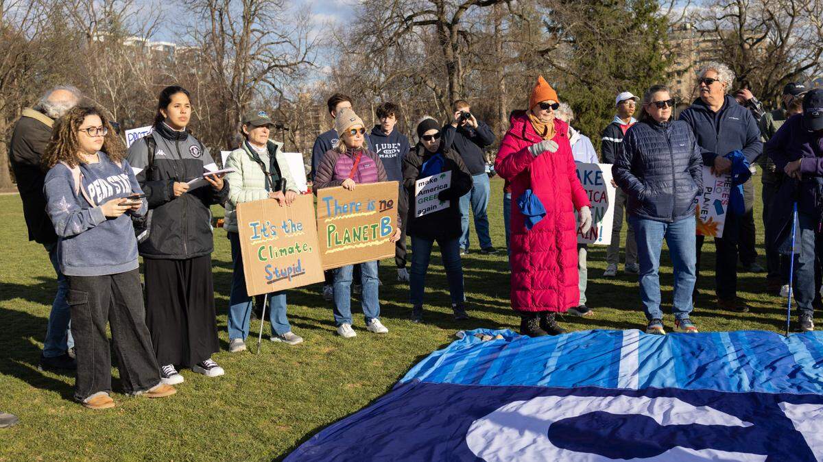 About 50 people attended a climate rally held on Monday, March 24, 2025 on the HUB lawn.