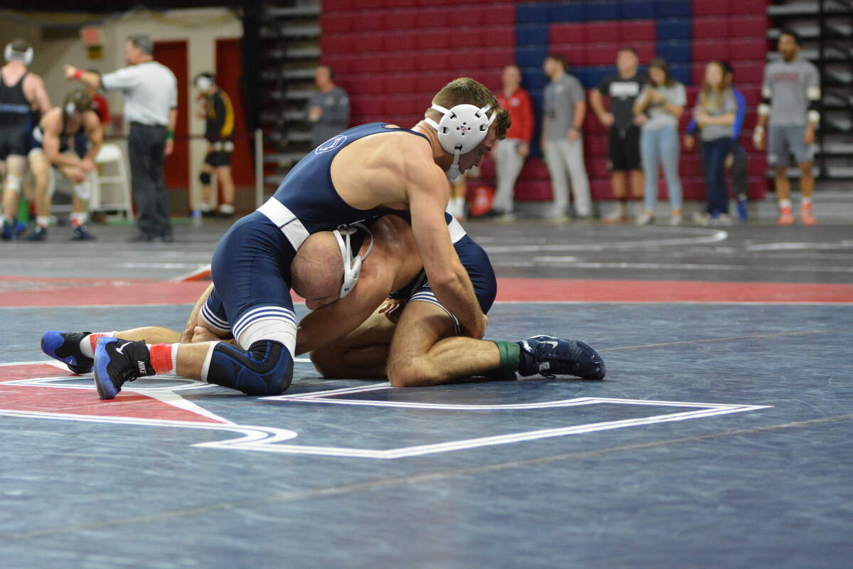 Penn State’s Brady Berge, top, attempts to fight off a shot attempt from teammate Jarod Verkleeren in their 149-pound semifinal match during the Keystone Classic on Sunday. Berge beat Verkleeren 3-2 and went on to finish second after medically forfeiting in the finals due to an injury he suffered against Verkleeren.